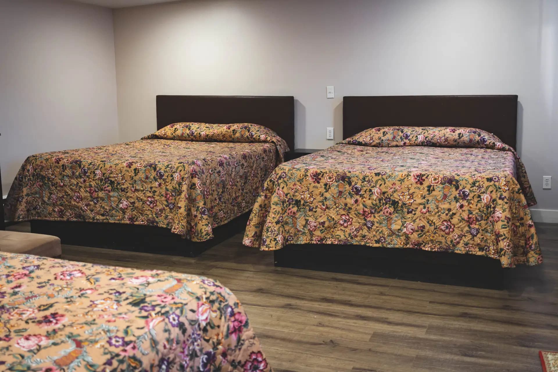 Triple Room at Kluane Park Inn - Three queen beds, compact bathroom