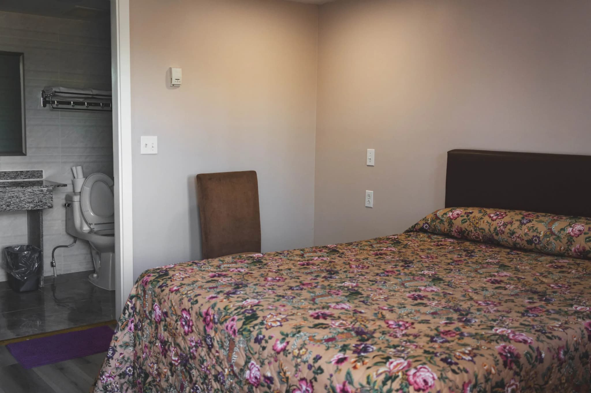 Single room with queen bed at Kluane Park Inn - Clean and comfortable accommodation